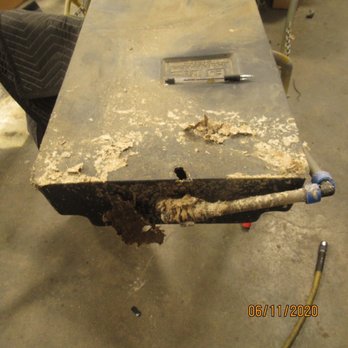 Cassones RV - Picture of hole in black water tank after repair shop removed it from RV I purchased at Cassone's. - RV Dealers Near Me - Mesa, Arizona