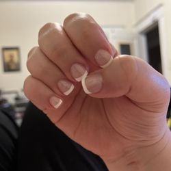 City Nail - Acrylic French manicure with gel polish.