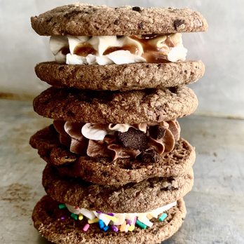 Minnie's Bake Shop - a stack of chocolate cookies with marshmallows - Desserts Near Me Minnie's Bake Shop - a stack of chocolate cookies with marshmallows - Desserts Near Me