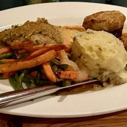 Steak and grouper "surf and turf" plate. Both done quite nicely. Steak and grouper "surf and turf" plate. Both done quite nicely.