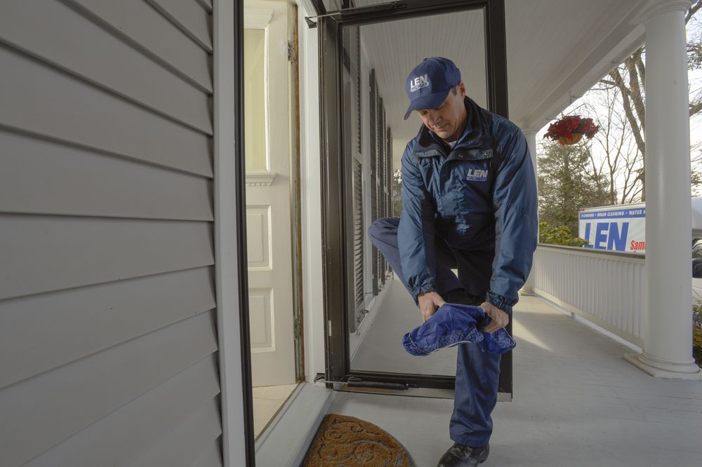 Slide of Len The Plumber