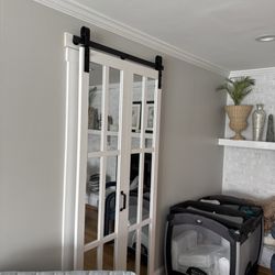 Three Crafters - The customer wanted a normal door switched to a bifold barn door. This flawlessly working install was the result.