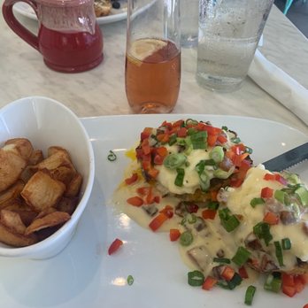 Another Broken Egg Cafe - Crab cake Benedict and cranberry mimosa - Breakfast & Brunch Near Me - Winter Park, Florida Another Broken Egg Cafe - Crab cake Benedict and cranberry mimosa - Breakfast & Brunch Near Me - Winter Park, Florida