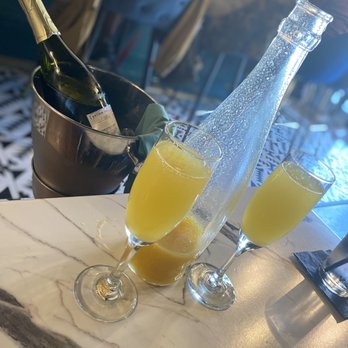 Breakfast At Barneys - Pineapple Mimosa. Please notice there's no food on the table. - Breakfast & Brunch Near Me - Atlanta, Georgia Breakfast At Barneys - Pineapple Mimosa. Please notice there's no food on the table. - Breakfast & Brunch Near Me - Atlanta, Georgia