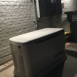 Nathan Snyder Electric - Generac Generator sits away from the transfer switches.