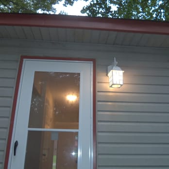 Sturgis Electric LLC - a light fixture on the side of a house - Electricians Near Me Sturgis Electric LLC - a light fixture on the side of a house - Electricians Near Me