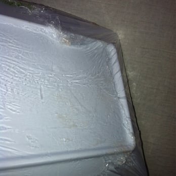 Georgis Catering - The back of the fruit tray I ordered. The heat wrapped plastic works like a charm. And no liquid from the fruit collecting. - Caterers Near Me - Chicago, Illinois Georgis Catering - The back of the fruit tray I ordered. The heat wrapped plastic works like a charm. And no liquid from the fruit collecting. - Caterers Near Me - Chicago, Illinois