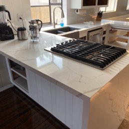 Kitchen isn't finished, but here's the beautiful waterfall countertop he did for us. Kitchen isn't finished, but here's the beautiful waterfall countertop he did for us.