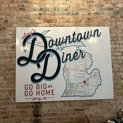 Original sign relocated from Perry to Owosso