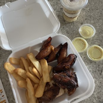 Super Chicken - 1/4 White Meat Chicken with Fries and Plantains & a tiramisu. The delicious mild yellow sauce. - Peruvian Near Me - Reston, Virginia Super Chicken - 1/4 White Meat Chicken with Fries and Plantains & a tiramisu. The delicious mild yellow sauce. - Peruvian Near Me - Reston, Virginia