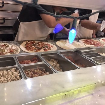 Zoli's NY Pizza - Pizza making! - Pizza Near Me - Addison, Texas Zoli's NY Pizza - Pizza making! - Pizza Near Me - Addison, Texas
