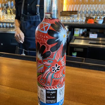 Mochilero Kitchen - Hand painted mezcal bottle from woman owned distillery in Mexico. - Mexican Near Me - Peoria, Arizona Mochilero Kitchen - Hand painted mezcal bottle from woman owned distillery in Mexico. - Mexican Near Me - Peoria, Arizona