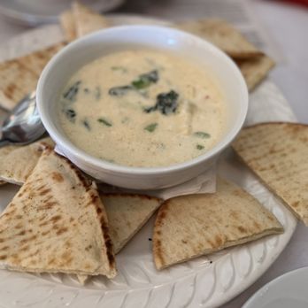 Tony And Luigis - a bowl of soup and pita chips - Italian Near Me - Georgetown, Texas Tony And Luigis - a bowl of soup and pita chips - Italian Near Me - Georgetown, Texas