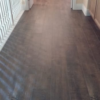 Hernandez Hardwood - cool suede laminate with 6" baseboards. - Flooring Near Me - Riverside, California Hernandez Hardwood - cool suede laminate with 6" baseboards. - Flooring Near Me - Riverside, California