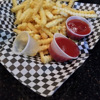 The District Pub & Kitchen - Large order of crinkle  cut fries - Bars Near Me - El Paso, Texas