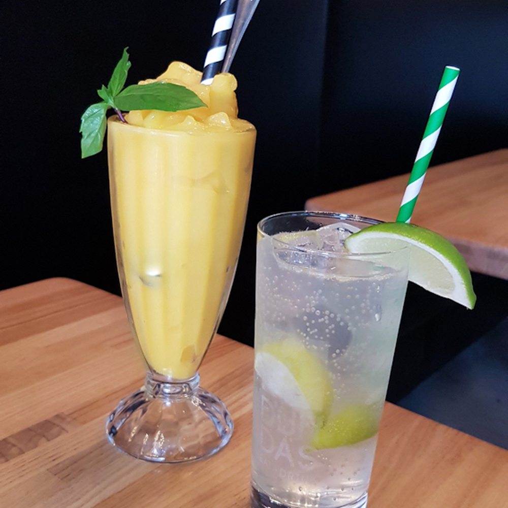 mango smoothie and lime soda mango smoothie and lime soda