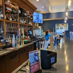 Fish City Grill - View of the bar. Jadyn's back is facing me