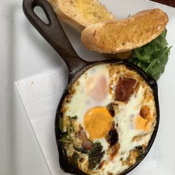 Cafe Mondial - Baked eggs with halumi cheese and chorizo sausage