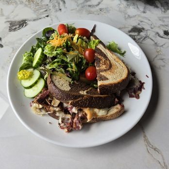 Casper’s Bistro - Classic Rueben (Delicious) I upgraded from fries to a Salad with housemade Champagne Vinaigrette - American Near Me - Goodlettsville, Tennessee
