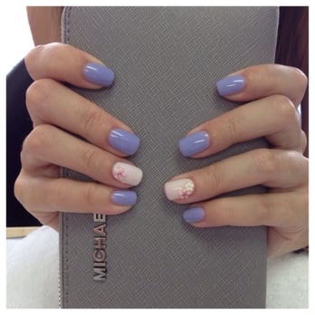 De Paris Nail Spa - Gel polish, mood color change gel polish on ring fingers with designs - Skin Care Near Me - Newark, California De Paris Nail Spa - Gel polish, mood color change gel polish on ring fingers with designs - Skin Care Near Me - Newark, California