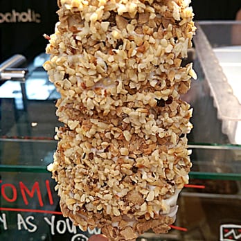 Popbar - Hazelnut with drizzled white chocolate with pistachios and hazelnut on one side - Desserts Near Me - Anaheim, California Popbar - Hazelnut with drizzled white chocolate with pistachios and hazelnut on one side - Desserts Near Me - Anaheim, California