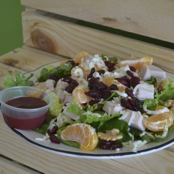 Welbeze Juice + Eatery - Turkey Cranberry Salad, roasted turkey breast, romaine, mozzarella, dried cranberries, walnuts, mandarin orange, raspberry vinaigrette. - Cafes Near Me - Depew, New York Welbeze Juice + Eatery - Turkey Cranberry Salad, roasted turkey breast, romaine, mozzarella, dried cranberries, walnuts, mandarin orange, raspberry vinaigrette. - Cafes Near Me - Depew, New York