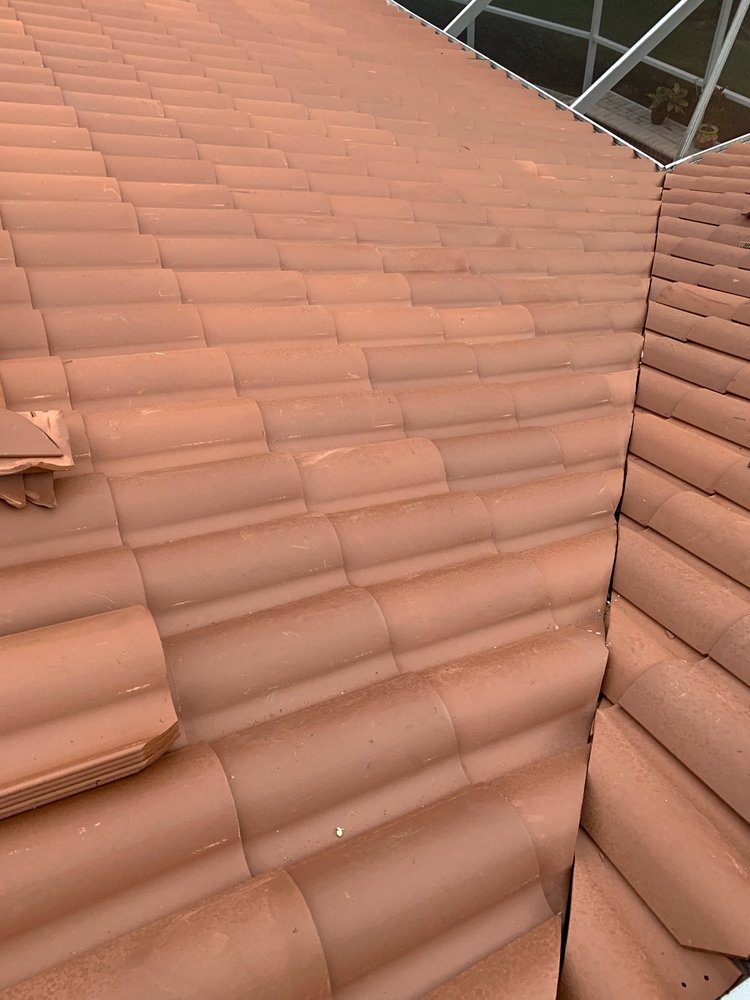 Slide of Mr. & Mrs. Shingles Roofing