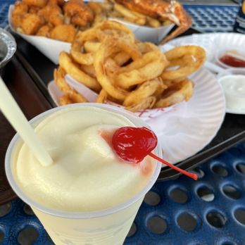 Johnny's Reef Restaurant - Piña colada, onion rings - Seafood Near Me - Bronx, New York Johnny's Reef Restaurant - Piña colada, onion rings - Seafood Near Me - Bronx, New York