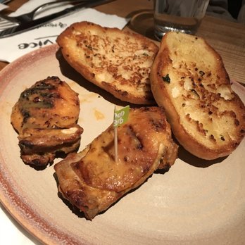 Nando's Peri-Peri - Chicken thighs with garlic bread - Chicken Shop Near Me - Chicago, Illinois Nando's Peri-Peri - Chicken thighs with garlic bread - Chicken Shop Near Me - Chicago, Illinois