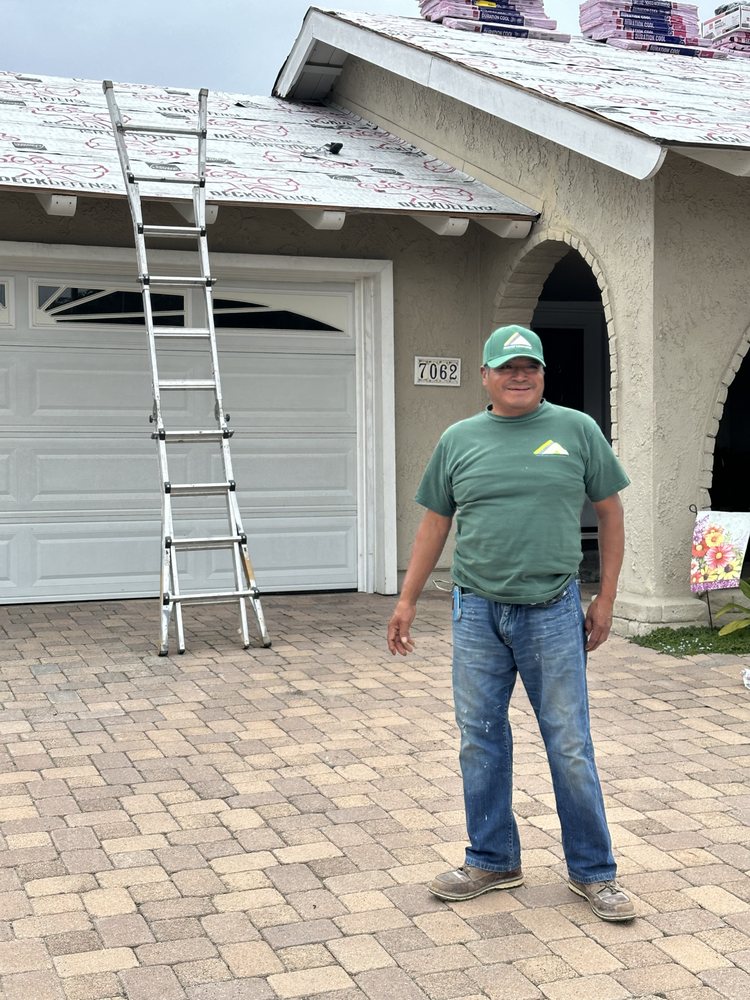 Slide of Reliance Roofing