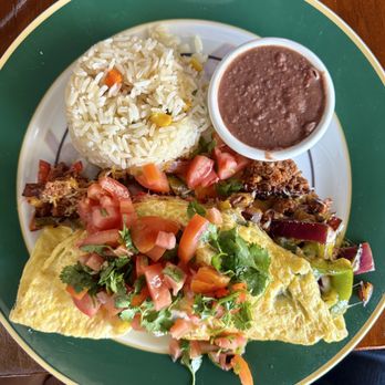 Clavo & Canela - Santa Fe omelette with rice and beans - Diners Near Me - Antioch, California Clavo & Canela - Santa Fe omelette with rice and beans - Diners Near Me - Antioch, California