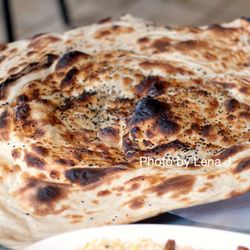 Aldaar Restaurant - Rashush ($2.99) - huge size! Flaky and stretchy bread, comes out piping hot