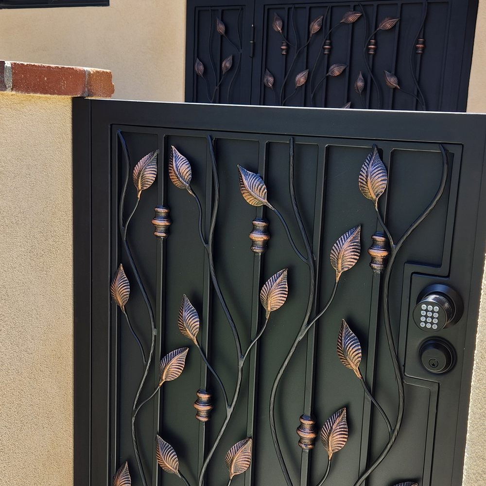 Exotic Iron Works - 2 new gates close up from Exotic Iron Works. They both have key pads and locks. - Fences & Gates Near Me - Los Angeles, California