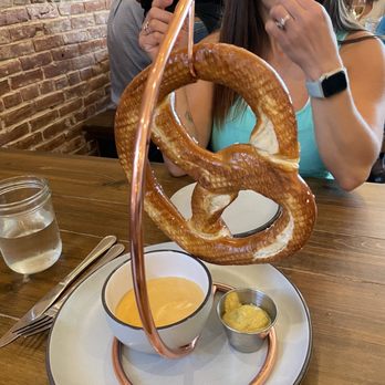 Prost Beer Hall - My daughters pretzel with beer cheese. - Cocktail Bars Near Me - Elk Grove, California Prost Beer Hall - My daughters pretzel with beer cheese. - Cocktail Bars Near Me - Elk Grove, California