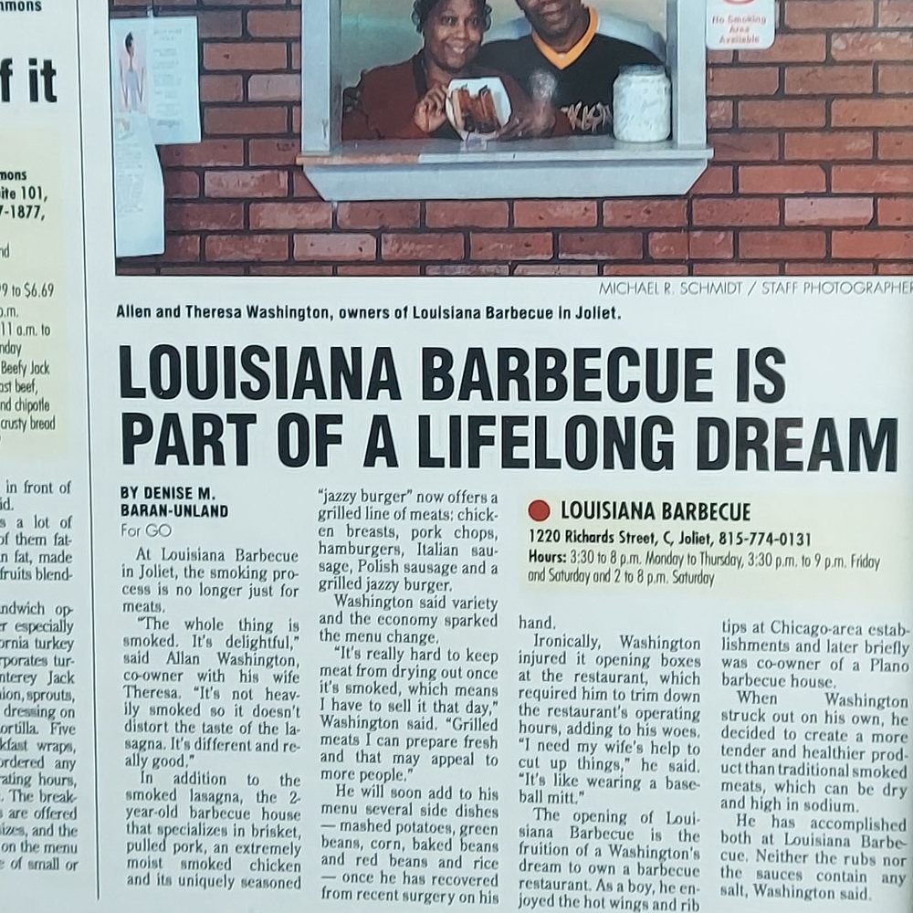 Louisiana Barbeque - a man and a woman in a window - Caterers Near Me - Joliet, Illinois Louisiana Barbeque - a man and a woman in a window - Caterers Near Me - Joliet, Illinois