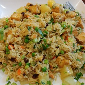 Thai Bistro - Pineapple fried rice with cashews, raisins, carrots, peas, onions, chives and tofu. My favorite meal! Enough for two large dinners. - Thai Near Me - Lawton, Oklahoma Thai Bistro - Pineapple fried rice with cashews, raisins, carrots, peas, onions, chives and tofu. My favorite meal! Enough for two large dinners. - Thai Near Me - Lawton, Oklahoma