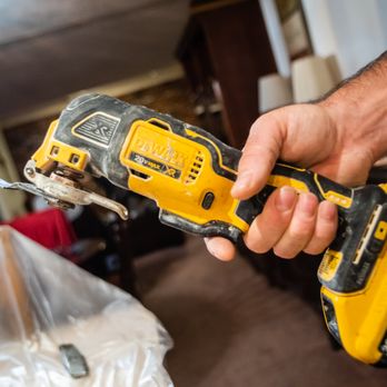 Cleary Construction - a hand holding a cordless drill - Flooring Near Me - Severn, Maryland Cleary Construction - a hand holding a cordless drill - Flooring Near Me - Severn, Maryland