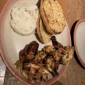 Nando's Peri-Peri - 12 wings, mashed potatoes, and garlic bread - Chicken Shop Near Me - Chicago, Illinois Nando's Peri-Peri - 12 wings, mashed potatoes, and garlic bread - Chicken Shop Near Me - Chicago, Illinois
