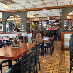 Kettelhut's Smokehouse - Bar section located on back wall, plenty of seating for those who prefer a table instead of booths.