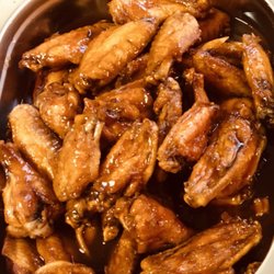 Tops Food & Catering - Sweet Heat Wings one bite you will find yourself with a whole plate of them!
