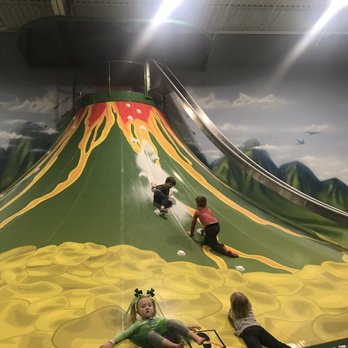 Lava Island - Soft and challenging volcano climbing structure with a giant slide to get down. - Trampoline Parks Near Me - Aurora, Colorado Lava Island - Soft and challenging volcano climbing structure with a giant slide to get down. - Trampoline Parks Near Me - Aurora, Colorado