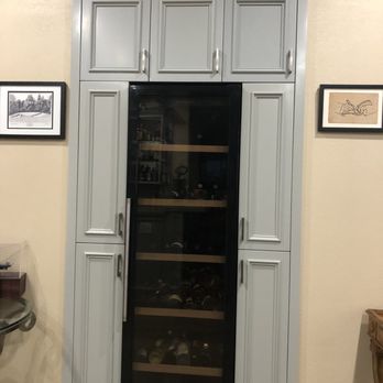 VIBA Construction - a wine cooler in the corner of a room - General Contractors Near Me VIBA Construction - a wine cooler in the corner of a room - General Contractors Near Me