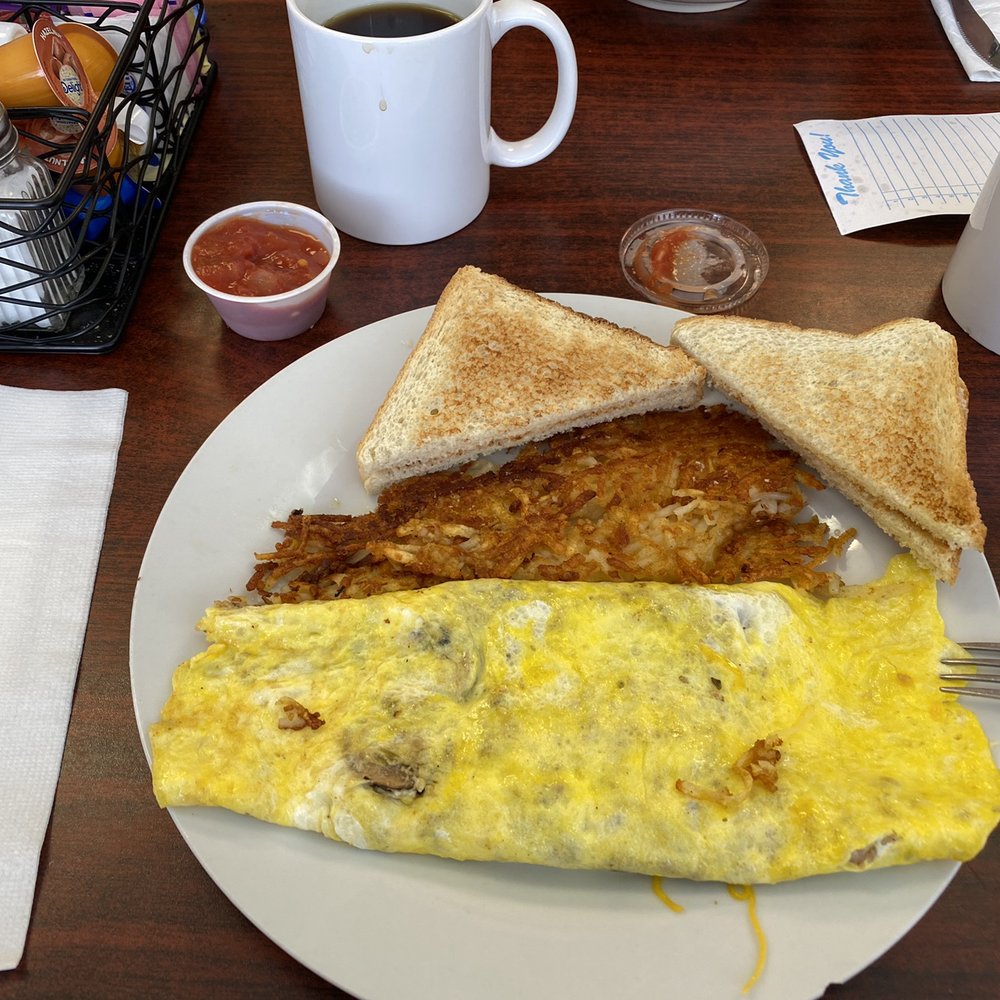 Simone's Cafe - Sausage, mushroom and cheddar omelette with toast, hash browns and side of salsa. - Cafes Near Me - Guthrie, Oklahoma Simone's Cafe - Sausage, mushroom and cheddar omelette with toast, hash browns and side of salsa. - Cafes Near Me - Guthrie, Oklahoma