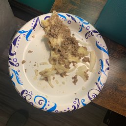 A cheesesteak Stromboli that's FULL OF RAW ONIONS!