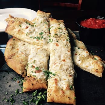 Screaming Banshee Pizza - SCREAMING STIX with Cheese | $5.95
Housemade Wood-fired Bread Stix with Dipping Sauce - Pizza Near Me - Bisbee, Arizona Screaming Banshee Pizza - SCREAMING STIX with Cheese | $5.95
Housemade Wood-fired Bread Stix with Dipping Sauce - Pizza Near Me - Bisbee, Arizona