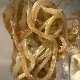Pile of grilled onions I removed from my burger, I left a reasonable amount on the burger. Pile of grilled onions I removed from my burger, I left a reasonable amount on the burger.