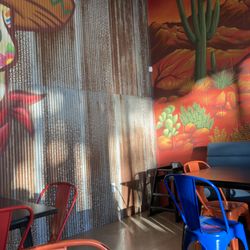 Old Pueblo Grill - Metal and cinder block walls.