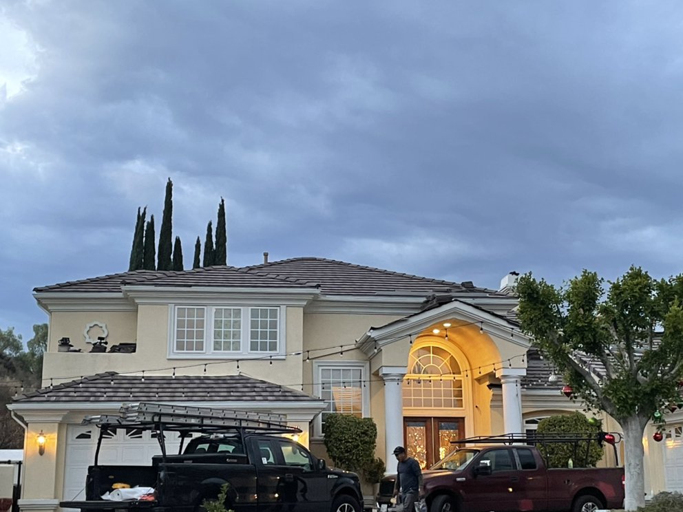 Slide of Monarch Roofing