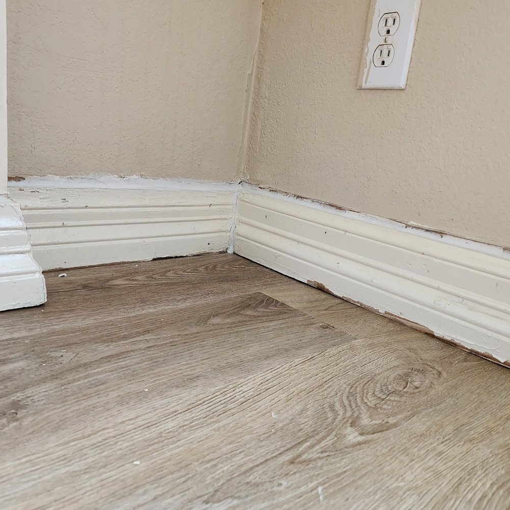 Flooring Direct - Exposed drywall gaps and damaged baseboards - Flooring Near Me - Dallas, Texas
