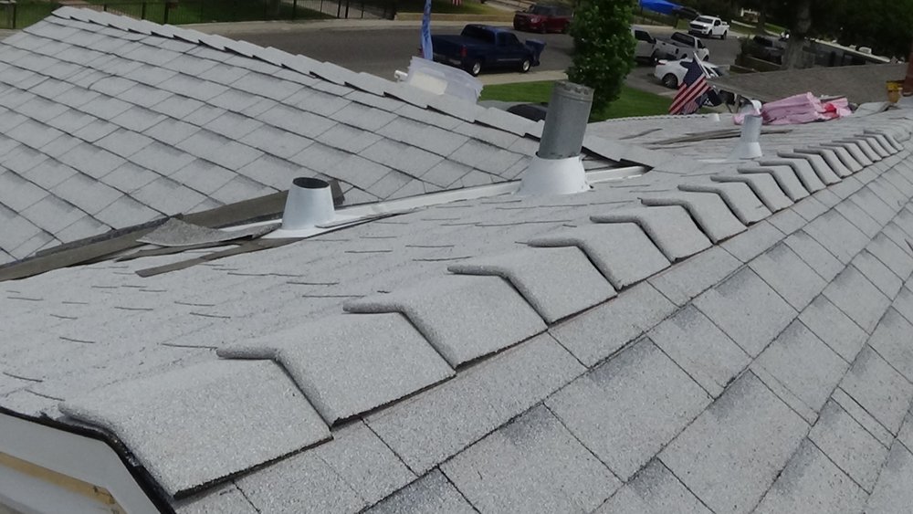 Slide of Quality Roofing Company